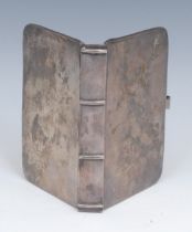 An 18th century silver book cover, quite plain, the hinged covers restrained by a clasp, 13.6cm