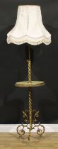 Interior Design - a gilt brass and onyx telescopic floor lamp, incorporating a circular wine