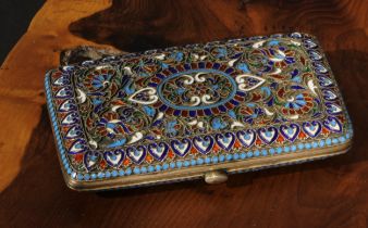 A Russian silver and cloisonne enamel rounded rectangular cigarette case, hinged cover, 10cm long,
