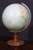 A mid-20th century 13" terrestrial globe, the turned base set with a compass, 52cm high