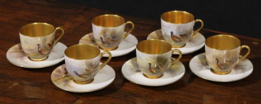 A set of six Royal Worcester coffee cups and saucers, painted by James Stinton, signed, with