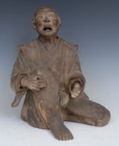 A Japanese terracotta figure, of a man, singing, 26cm high, early 20th century Provenance: Agatha