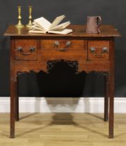 A George III oak lowboy, rectangular top with moulded edge above three drawers, brass swan neck
