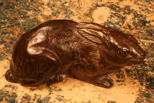 Alfred Lyndhurst Pocock (1882 - 1962), a terracotta cabinet sculpture, of a hare, unsigned, 8cm long