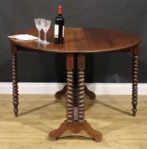 A 19th century Anglo-Indian hardwood Sutherland table, spirally turned legs and stretcher, shaped
