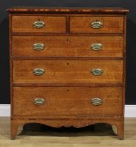 A George III oak chest, of two short and three long drawers, shaped apron, bracket-form base,