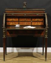 A 19th century French gilt metal mounted rosewood, marquetry and penwork cylinder desk, pierced