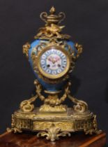 A 19th century French gilt metal and porcelain mantel clock, 10cm dial with Roman numerals,
