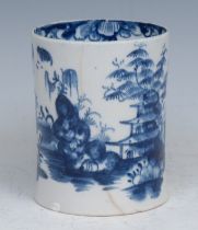 An early Lowestoft mug, painted in underglaze blue with Chinese landscape, the interior rim with a