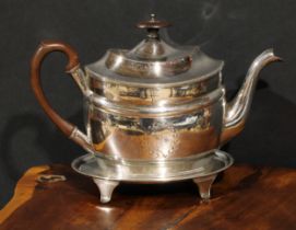 A George III Old Sheffield Plate oval teapot and stand, bright-cut engraved, and outlined with