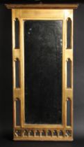 A 19th century Gothic Revival giltwood and painted pier glass rectangular mirror plate flanked by