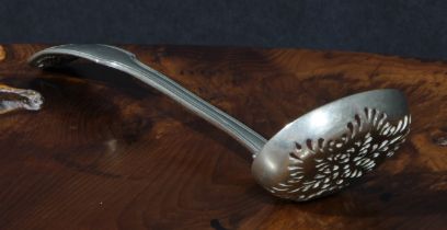 A 19th century Fiddle Thread and Shell pattern sifter spoon, possibly Colonial, 16cm long, pseudo