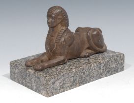 A 19th century cast iron library model, of a Sphinx, rectangular granite base, 19cm wide