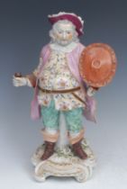 A Derby patch mark figure, Quinn as Sir John Falstaff, he stands holding an oval shield, wearing a