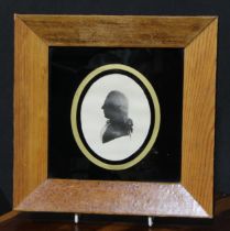 Interior Decoration - a George III style silhouette, of a gentleman, bust length facing to dexter,