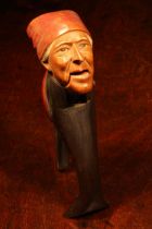 Nutcrackers - a Black Forest novelty lever-action nut cracker, carved and painted as a gentleman