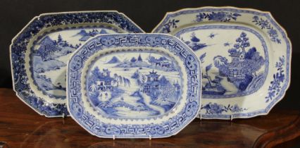 A Chinese canted rectangular meat plate, painted in tones of underglaze blue with pagodas and