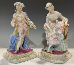 A pair of Continental porcelain figures, of a gallant and his beau, each finely dressed in the