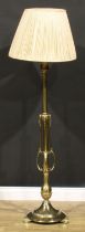 Interior Design - a Neoclassical Revival brass telescopic floor lamp, cast with ram heads, 136cm