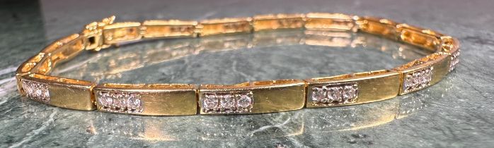 A diamond tennis bracelet, fifteen links each set with three round brilliant cut diamonds, total