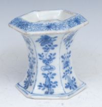A Chinese porcelain hexagonal pedestal trencher salt, painted in tones of underglaze blue with