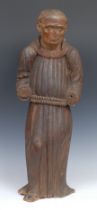 A Continental softwood carving, of a Franciscan friar, 62cm high, 18th/19th century
