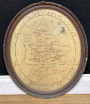 A George III oval needlework map sampler, England and Wales, worked with the counties and seated