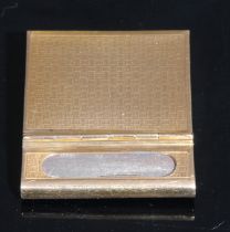 An unusual rectangular 9ct gold book match case, hinged to access the match, engine turned, 33.2g,