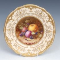 A Coalport shaped circular plate, painted by Frederick Herbert Chivers, signed, with ripening