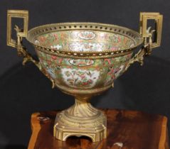 A Chinese famille rose circular bowl, painted in the typical Cantonese manner, European gilt