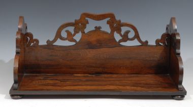 A William IV rosewood rectangular book carrier, double-sided, pierced and shaped end supports and