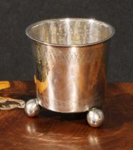 A Scandinavian silver bucket shaped beaker, wrigglework engraved, ball feet, 7cm high, probably