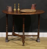 A George III oak coaching table, circular top, turned underframe, 77cm high, 98.5cm diameter, c.1800