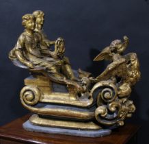 A Continental Baroque giltwood and gesso carving, of figures drawn in a chariot surmounted by an