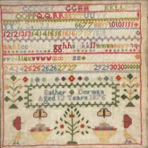 A Victorian needlework alphabet sampler, by Esther Dorman, Aged 12 Years, 1875, worked in coloured