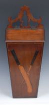 A George III mahogany knife box, shaped and pierced cresting, hinged sloping cover, the front inlaid