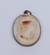 A 19th century Grand Tour shell cameo pendant, carved with a bust length portrait of the goddess