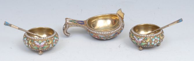 A Russian silver-gilt and cloisonne enamel kovsch, decorated in polychrome enamel with stylised