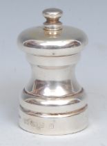 An Elizabeth II silver pepper mill or grinder, 7cm high, London 2012