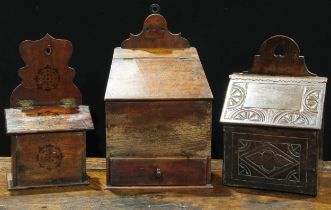 A George III mahogany salt or candle box, shaped cresting, hinged sloping cover above a drawer, 44cm