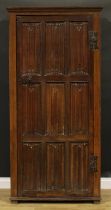 A ‘Gothic’ oak hall cupboard, rectangular door with nine linenfold panels, enclosing shelves,