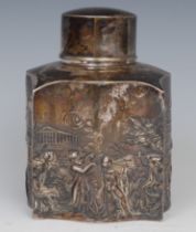 An Edwardian silver serpentine tea caddy, chased with a centaur and scenes from Antiquity, push-