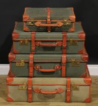 Luggage - a graduated set of Papworth Buckden canvas and leather suitcases, the largest 78cm wide