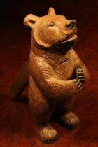 Nutcrackers - a Black Forest novelty lever-action nut cracker, as a bear, standing, full length,