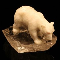 Alfred Lyndhurst Pocock (1882 - 1962), a white onyx carving, of a polar bear, four square upon a