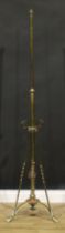 An early 20th century copper-accented brass telescopic floor lamp, 128.5cm raising to 169.5cm high