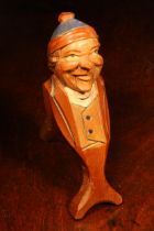 Nutcrackers - a Black Forest novelty lever-action nut cracker, carved and painted as a gentleman