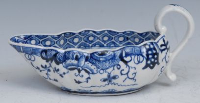 A Worcester lobed ovoid sauceboat, decorated in underglaze blue with Full Moon pattern, cell