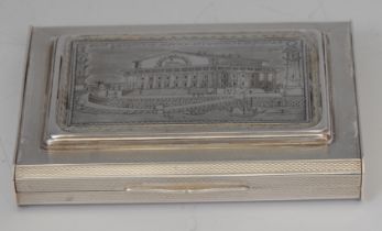 A Russian silver and niello rectangular snuff box, the hinged cover decorated with a view of a Neo-
