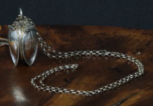 An Elizabeth II silver novelty pendant watch, as a flower bud, the petals unfolding to reveal a gilt